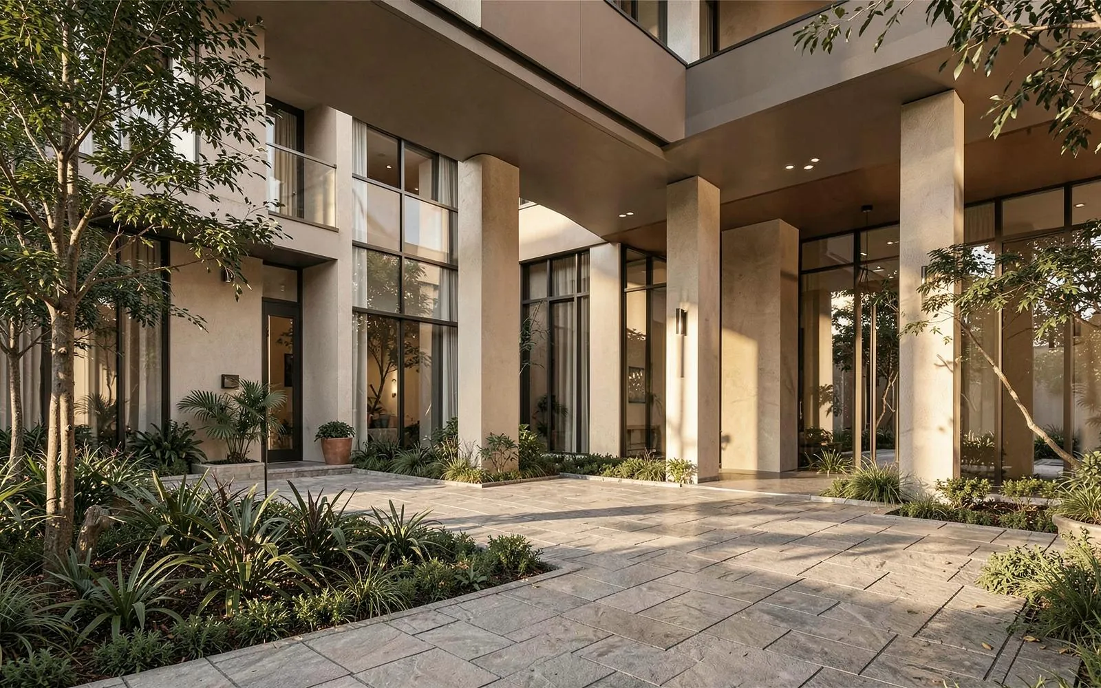 Landscaped arrival courtyard at a Vasishta Developers residence